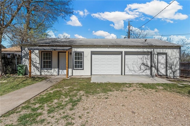 2211 Morrow Ave, Waco, TX 76707 - garage featuring fence and dirt driveway