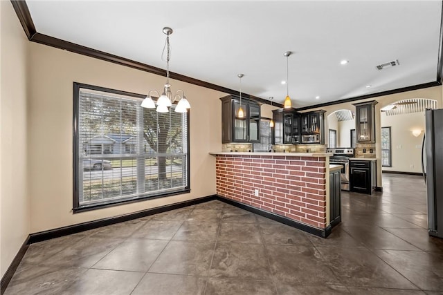 2124 S 4th St, Waco, TX 76706 - kitchen with a peninsula, appliances with stainless steel finishes, crown molding, and visible vents