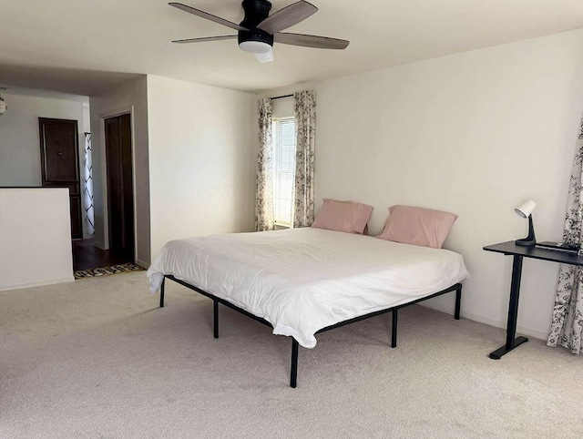 5204 Mansfield Rd, Arlington, TX 76017 - carpeted bedroom with a ceiling fan and baseboards