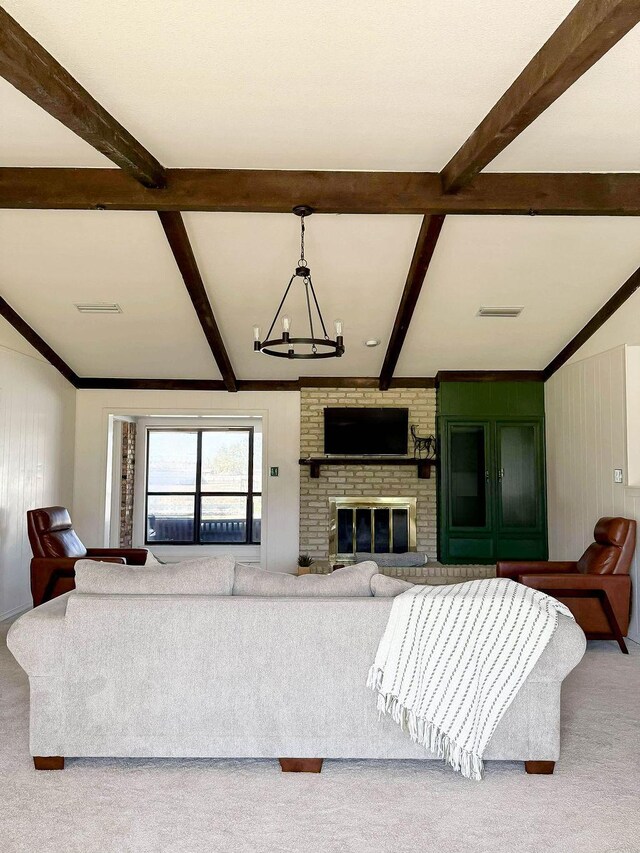 5204 Mansfield Rd, Arlington, TX 76017 - carpeted living room featuring an inviting chandelier, visible vents, and beam ceiling