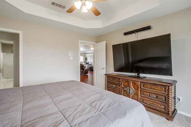 2212 Summit Dr, Burleson, TX 76028 - carpeted bedroom with a raised ceiling, ceiling fan, and baseboards