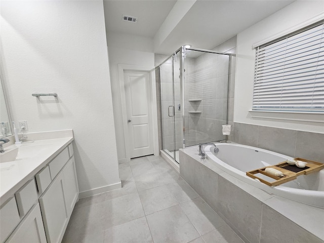 2856 Chester Dr, Celina, TX 75009 - bathroom featuring visible vents, a shower stall, baseboards, vanity, and a garden tub
