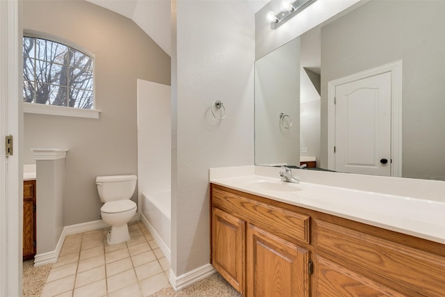 full bathroom with tile patterned flooring, toilet, vanity, and baseboards