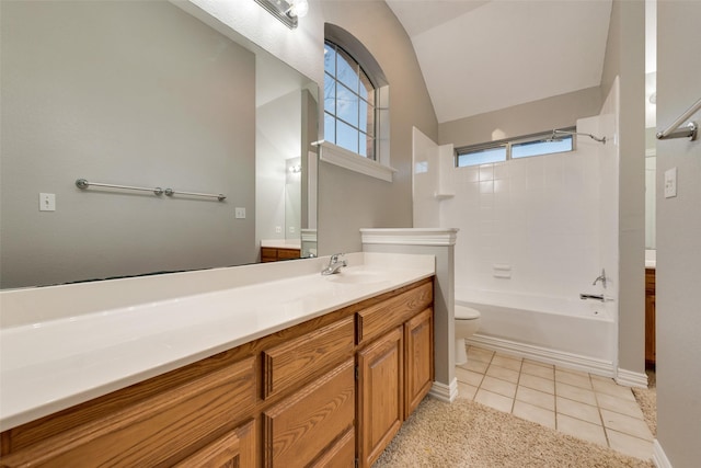 bathroom featuring tile patterned floors, vaulted ceiling, toilet, vanity, and shower / tub combination