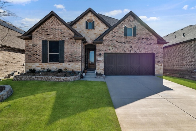 113 Glenwood Dr, Oak Point, TX 75068 - french provincial home with concrete driveway, a front lawn, stone siding, brick siding, and an attached garage