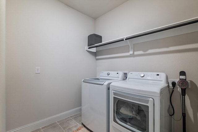 113 Glenwood Dr, Oak Point, TX 75068 - laundry room with washing machine and dryer and light tile patterned floors