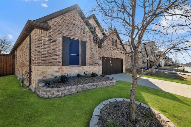 113 Glenwood Dr, Oak Point, TX 75068 - view of side of property with brick siding and concrete driveway