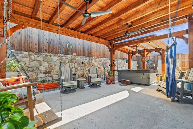 113 Glenwood Dr, Oak Point, TX 75068 - fenced backyard featuring ceiling fan, a patio area, and a hot tub