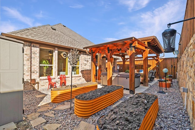 113 Glenwood Dr, Oak Point, TX 75068 - fenced backyard featuring a hot tub and a gazebo