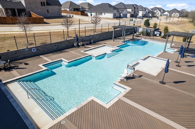 113 Glenwood Dr, Oak Point, TX 75068 - community pool with a residential view, a pergola, a jacuzzi, and a patio