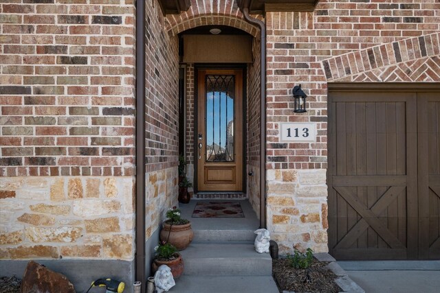 113 Glenwood Dr, Oak Point, TX 75068 - entrance to property featuring brick siding