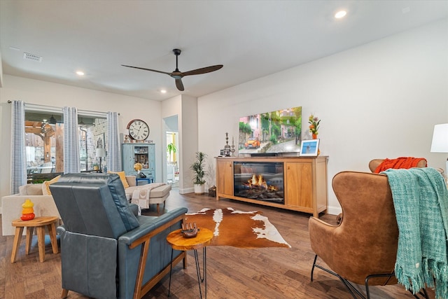 113 Glenwood Dr, Oak Point, TX 75068 - living room featuring recessed lighting, ceiling fan, wood finished floors, and a glass covered fireplace