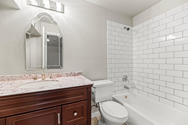 4512 Fletcher Ave, Fort Worth, TX 76107 - full bathroom with vanity, shower / bathing tub combination, toilet, and a textured wall