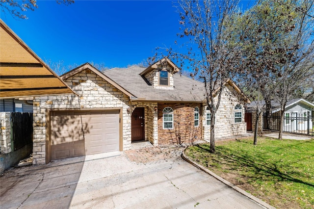 4512 Fletcher Ave, Fort Worth, TX 76107 - view of front of home with fence, driveway, a front lawn, a garage, and stone siding