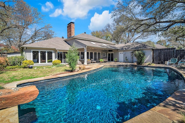 9702 Trail Hill Dr, Dallas, TX 75238 - view of swimming pool featuring a patio area, a fenced in pool, and fence