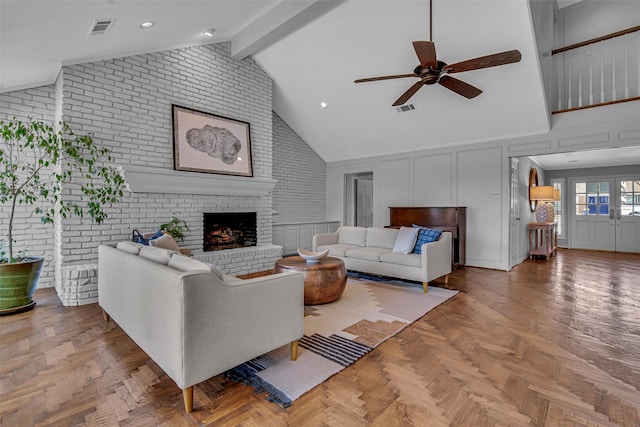 9702 Trail Hill Dr, Dallas, TX 75238 - living area featuring brick wall, ceiling fan, a fireplace, a decorative wall, and high vaulted ceiling