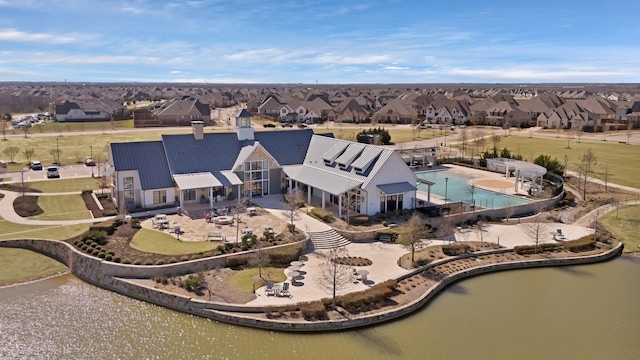 birds eye view of property with a residential view