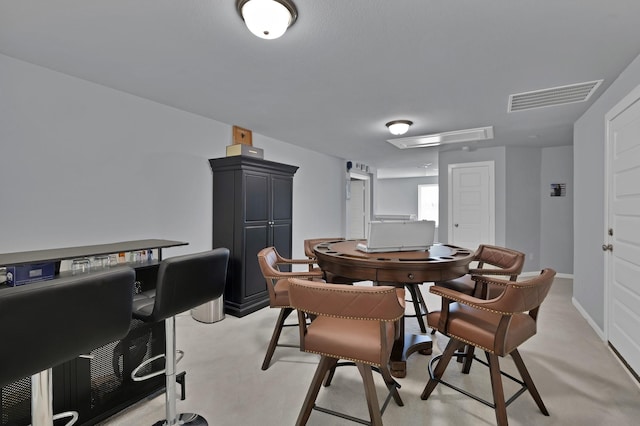 dining space featuring visible vents