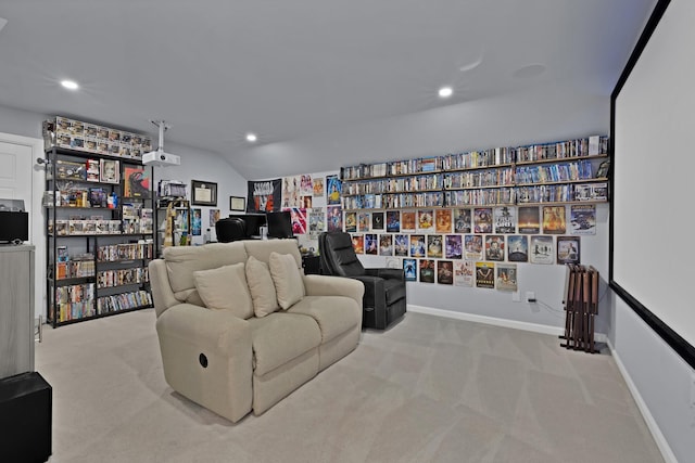 carpeted living room featuring baseboards and recessed lighting