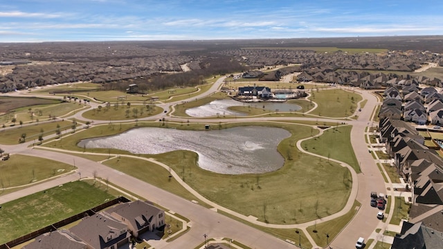 aerial view with a water view and a residential view