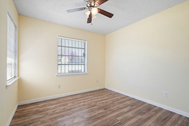 7918 Racine Dr, Dallas, TX 75232 - unfurnished room with baseboards, a textured ceiling, wood finished floors, and a ceiling fan