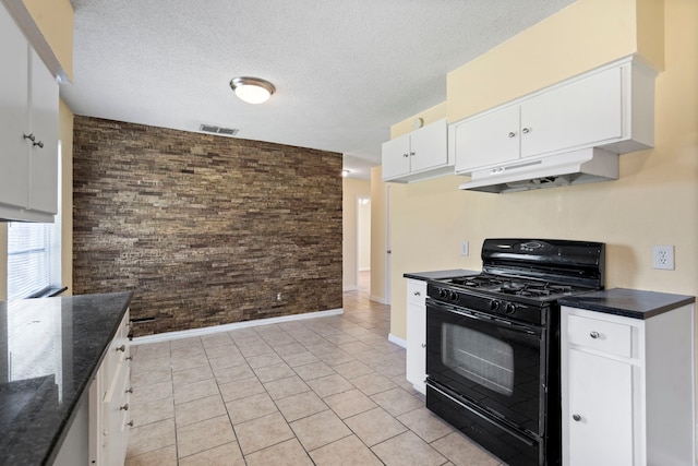7918 Racine Dr, Dallas, TX 75232 - kitchen with gas stove, visible vents, white cabinets, under cabinet range hood, and a textured ceiling