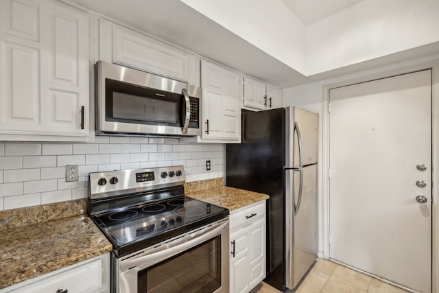 3105 San Jacinto St Unit 304, Dallas, TX 75204 - kitchen with stainless steel appliances, white cabinetry, tasteful backsplash, and stone counters