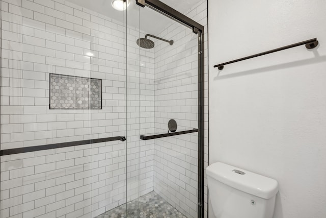 3105 San Jacinto St Unit 304, Dallas, TX 75204 - bathroom with a shower stall and toilet