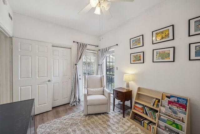 3105 San Jacinto St Unit 304, Dallas, TX 75204 - sitting room featuring a ceiling fan and wood finished floors