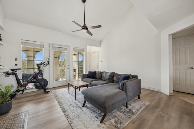3105 San Jacinto St Unit 304, Dallas, TX 75204 - living area featuring ceiling fan, light wood-style flooring, and high vaulted ceiling