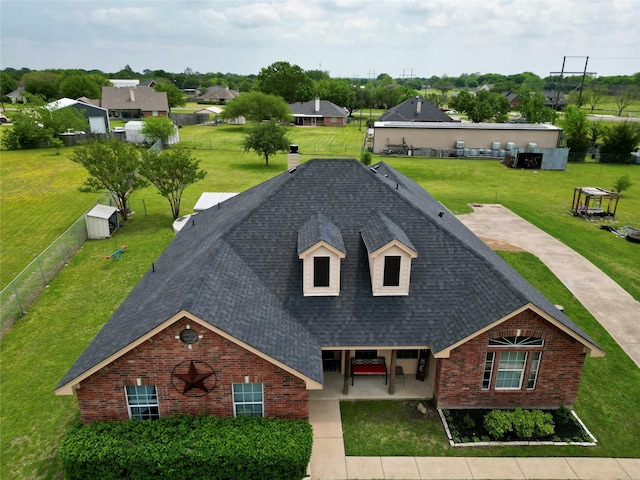 112 Robert Cir, Red Oak, TX 75154 - view of front facade featuring a front yard, brick siding, fence, and a shingled roof