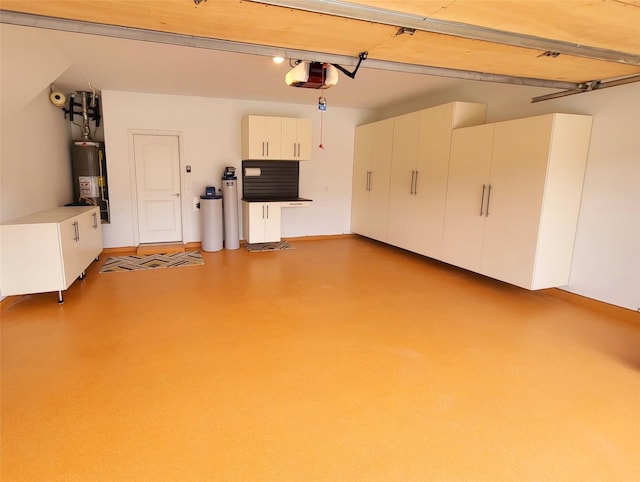 262 Jones St, Irving, TX 75063 - garage featuring a garage door opener and gas water heater