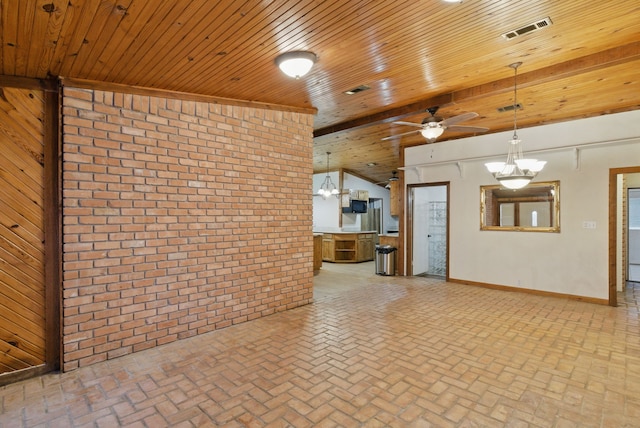 interior space featuring visible vents, ceiling fan with notable chandelier, wooden ceiling, and brick floor