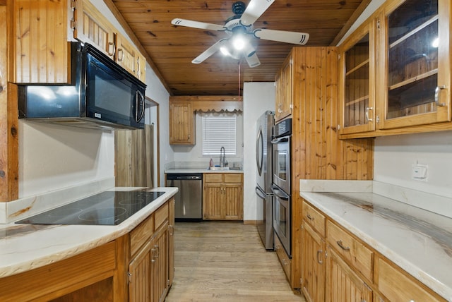 kitchen with ceiling fan, light wood-type flooring, wooden ceiling, black appliances, and a sink