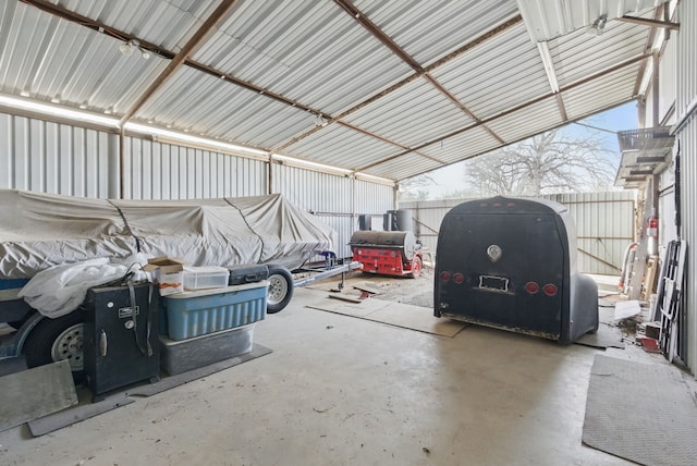garage featuring fence