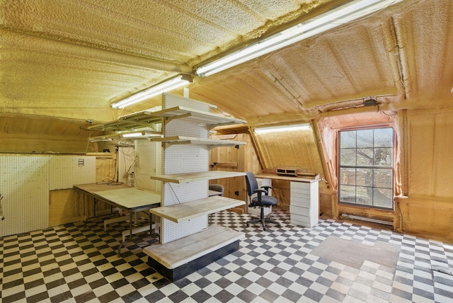 interior space featuring tile patterned floors and wooden walls
