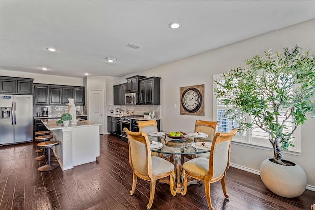108 Oakmont Dr, Argyle, TX 76226 - dining room with recessed lighting, visible vents, baseboards, and dark wood-type flooring