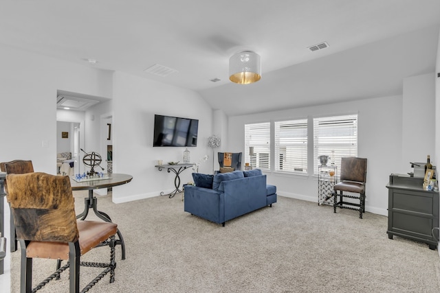 2860 Bluegill Ln, Prosper, TX 75078 - living area with light carpet, attic access, lofted ceiling, and baseboards