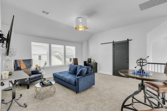 2860 Bluegill Ln, Prosper, TX 75078 - living area with a barn door, carpet floors, baseboards, and lofted ceiling