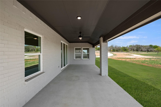 view of patio / terrace featuring ceiling fan