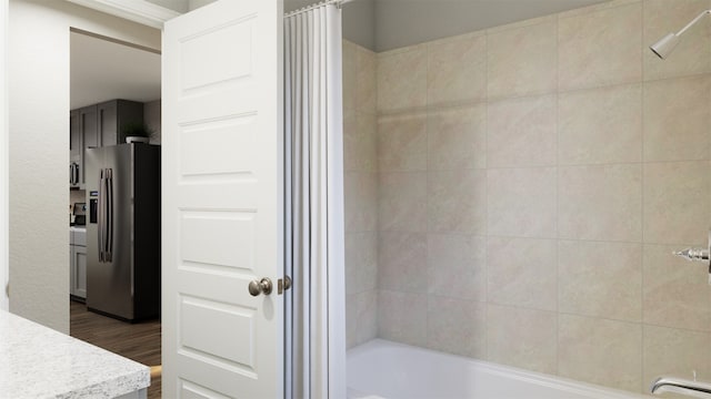 10609 Stag Ln, Fort Worth, TX 76036 - full bath with  shower combination and wood finished floors