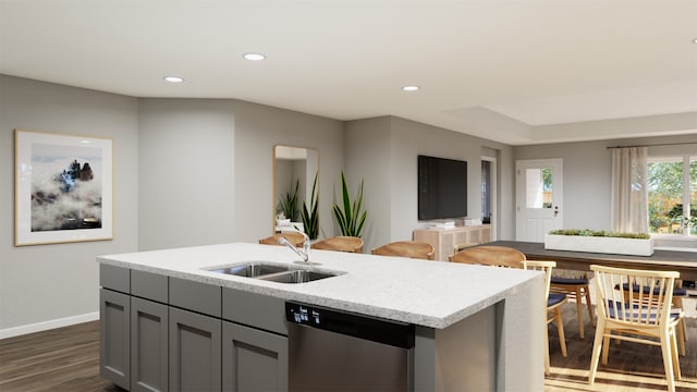 10609 Stag Ln, Fort Worth, TX 76036 - kitchen with stainless steel dishwasher, a sink, gray cabinets, dark wood-type flooring, and a kitchen island with sink