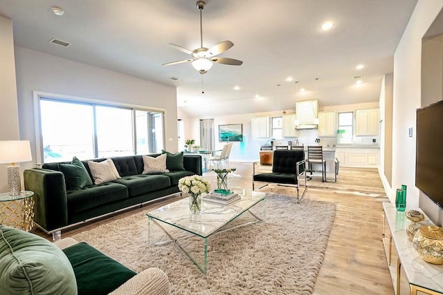 209 Chesapeake Dr, Forney, TX 75126 - living room with light wood-style floors, a ceiling fan, and recessed lighting
