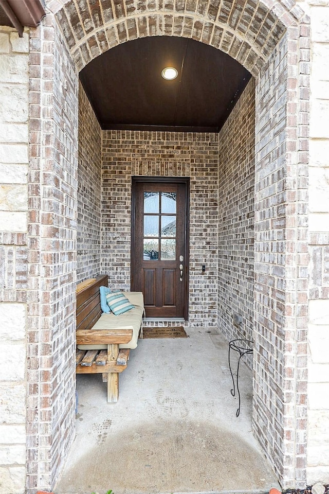 209 Chesapeake Dr, Forney, TX 75126 - doorway to property with brick siding