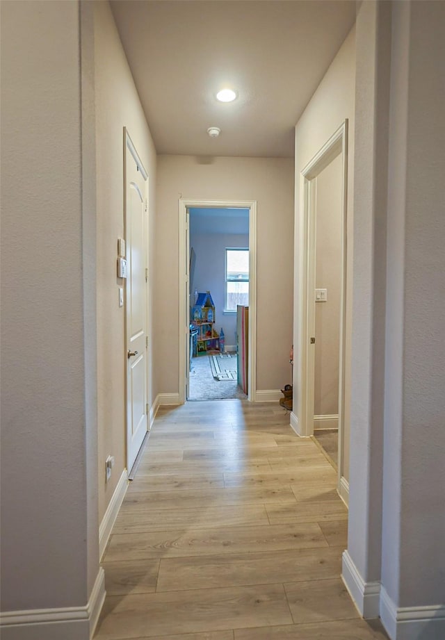 209 Chesapeake Dr, Forney, TX 75126 - hallway with light wood-style floors, recessed lighting, and baseboards