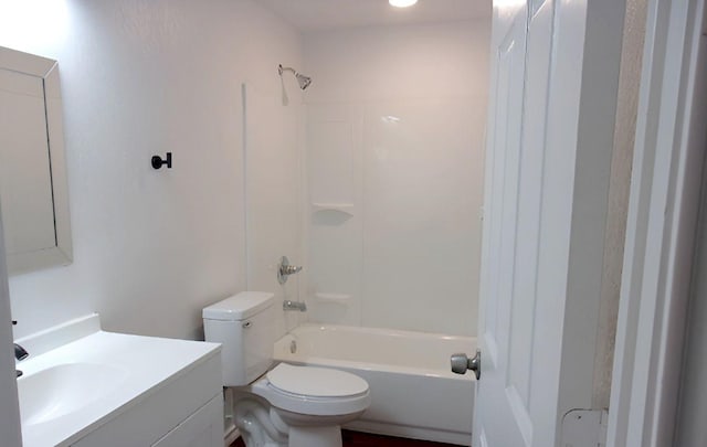 711 Dubois St, Denison, TX 75020 - full bath featuring bathing tub / shower combination, toilet, and vanity