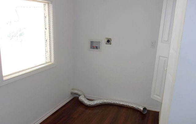 711 Dubois St, Denison, TX 75020 - laundry room featuring washer hookup, dark wood-style floors, baseboards, hookup for an electric dryer, and laundry area