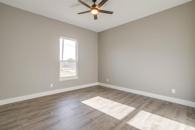 224 Ash Creek Dr W, Azle, TX 76020 - empty room featuring baseboards, ceiling fan, and wood finished floors