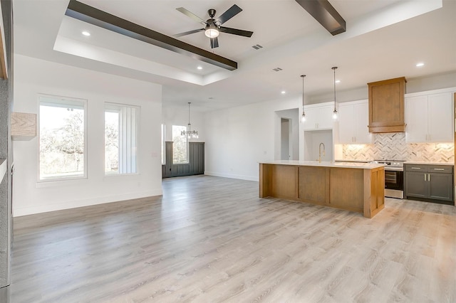 224 Ash Creek Dr W, Azle, TX 76020 - kitchen featuring beam ceiling, open floor plan, custom exhaust hood, decorative backsplash, and stainless steel electric range oven