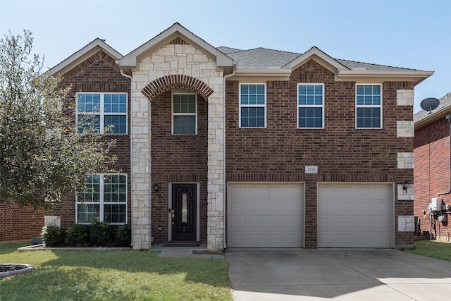 2224 Loreto Dr, Fort Worth, TX 76177 - view of front facade with driveway, an attached garage, brick siding, and stone siding